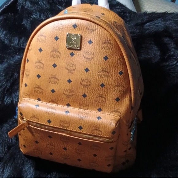 MCM Other - MCM Cognac Backpack Size Large Stark Studded In Visetos Brand NEW